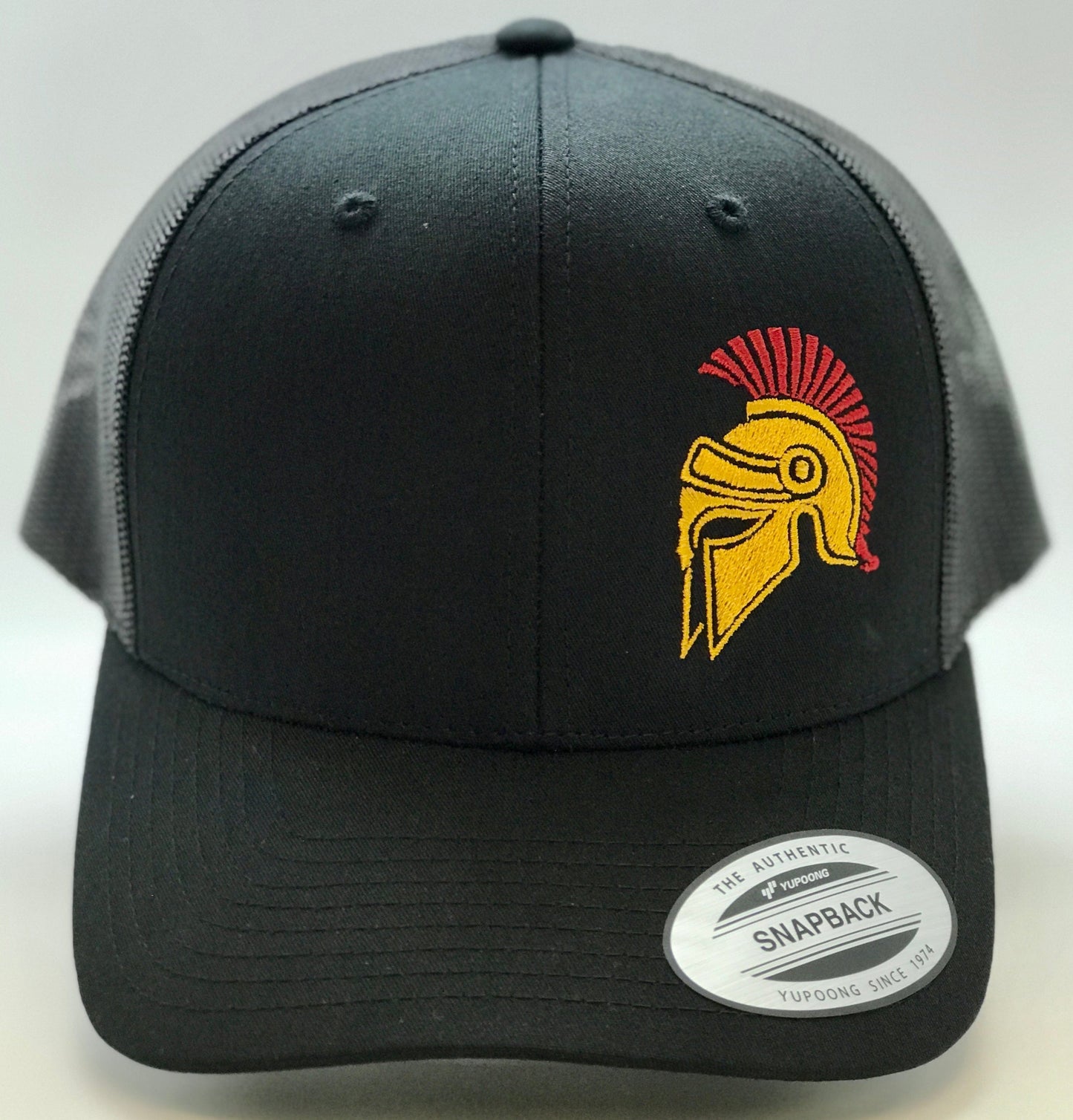 “Spartan Helmet snapback hat with tattoo-inspired design symbolizing strength, courage, and athletic spirit”