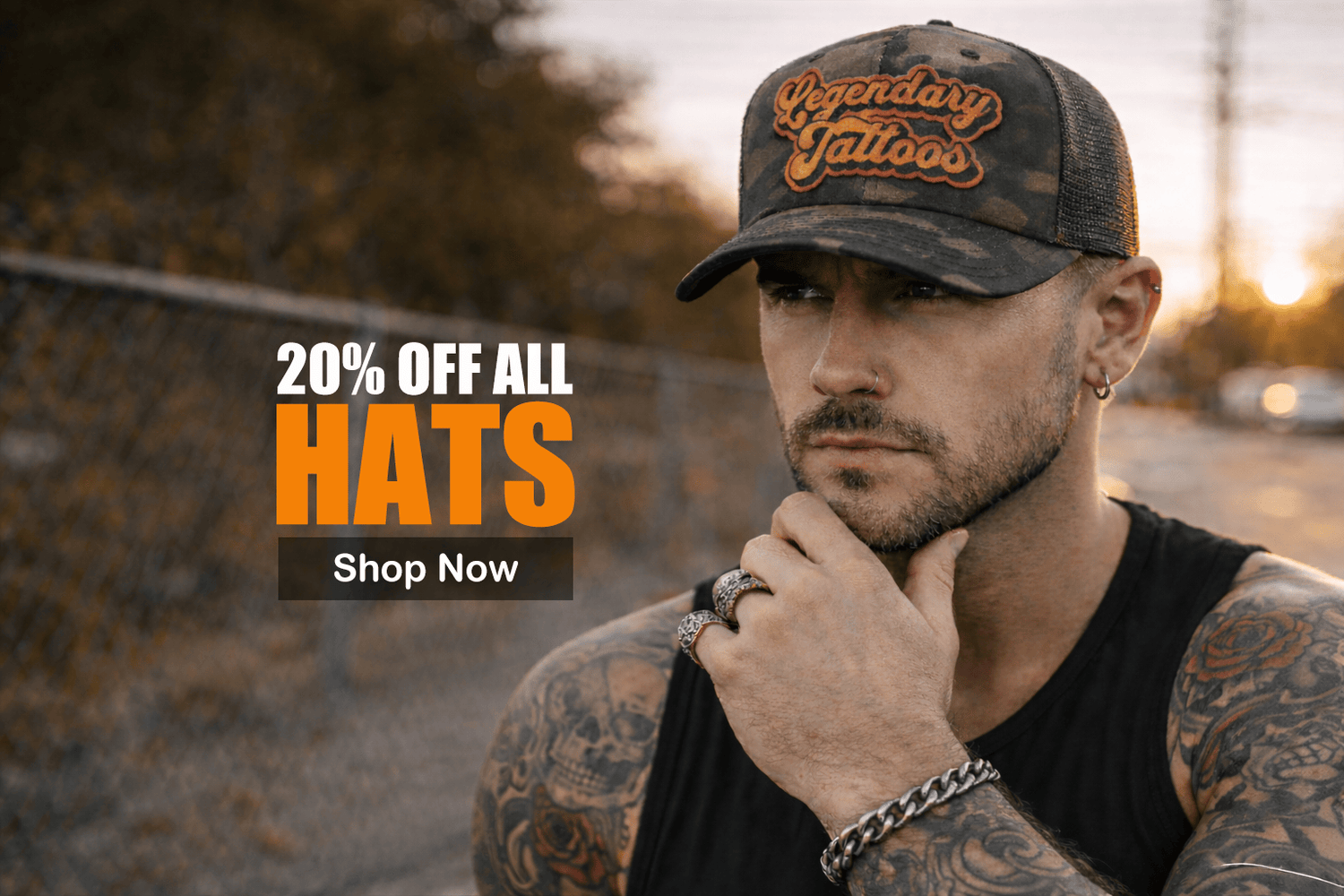 Man wearing a cap with tattoo-themed design, promotional text overlay for hats sale.